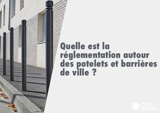 Potelet de voirie bicolore noir et blanc installé sur un trottoir pour empêcher le stationnement des véhicules