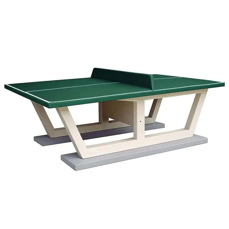 Table de ping-pong en béton verte posée sur son kit de dalles de répartition pour pelouse ou sable