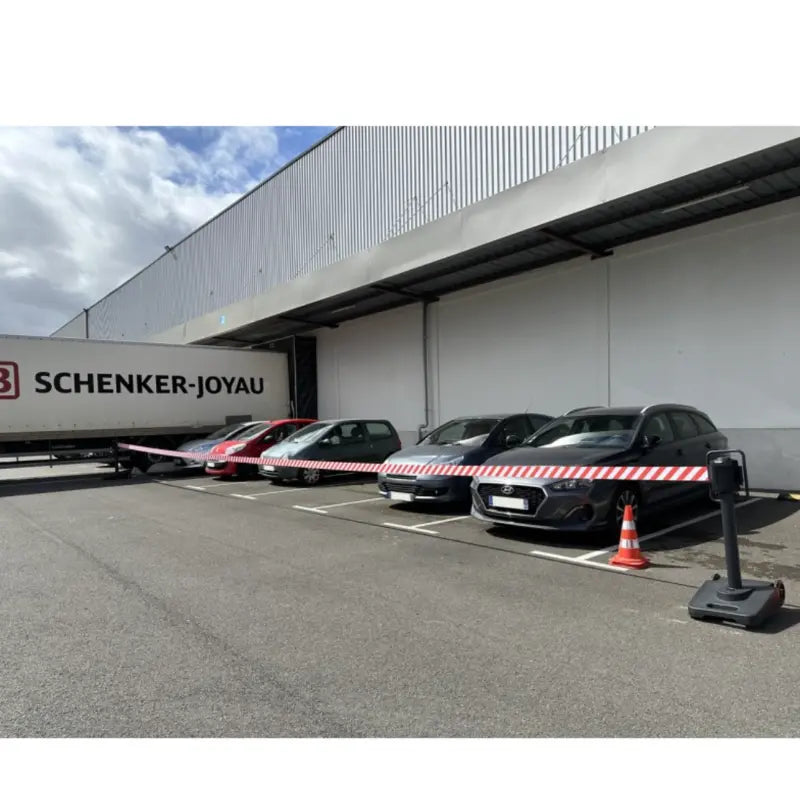 Chariot à sangle utilisé pour baliser une zone de travaux